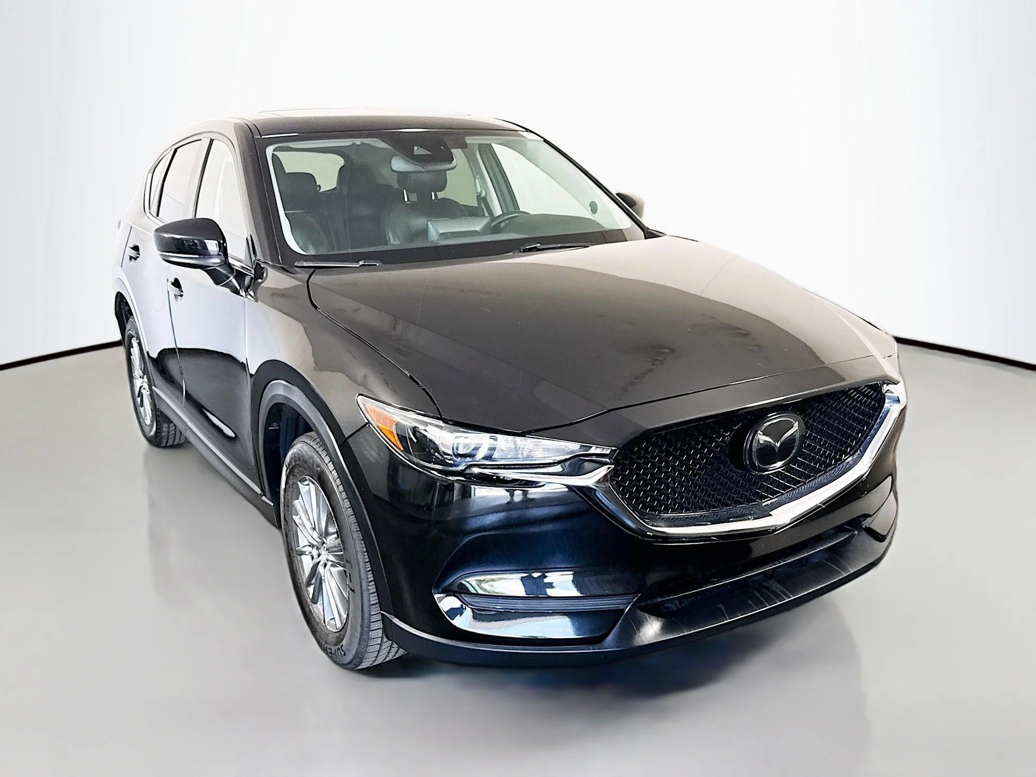 Used 2021 Jet Black Mica Mazda Touring image 1
