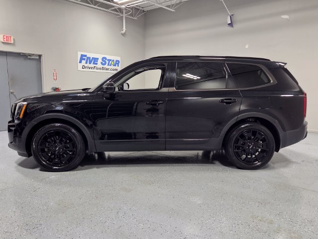 Used 2022 Black Kia EX image 4