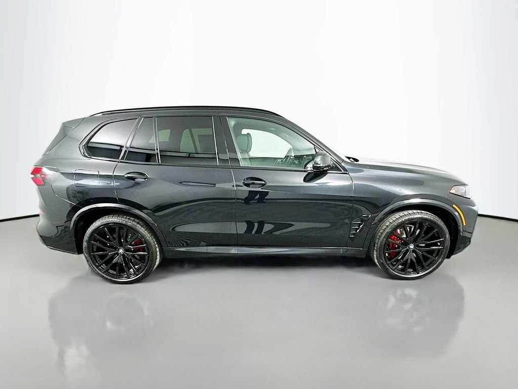 New 2026 Black Sapphire Metallic BMW sDrive40i image 4
