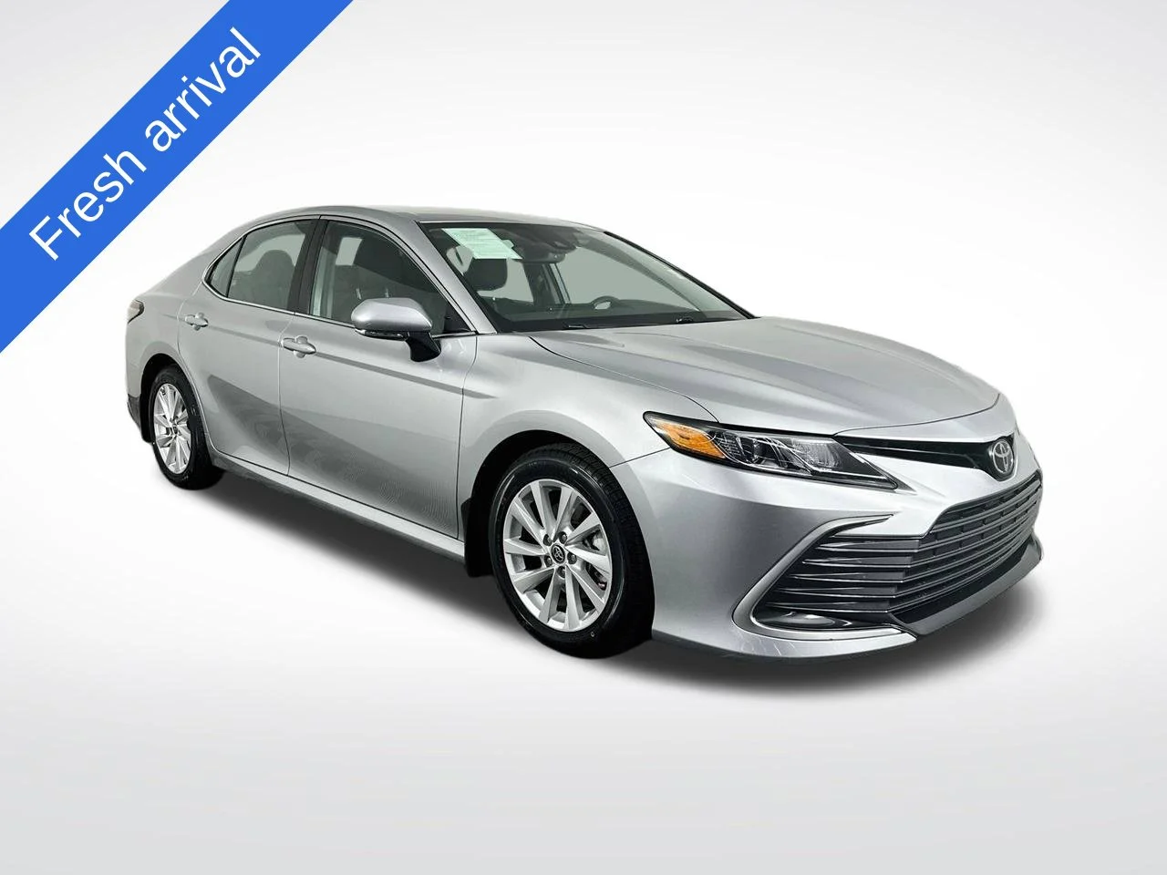 Used 2021 Celestial Silver Metallic Toyota LE image 1