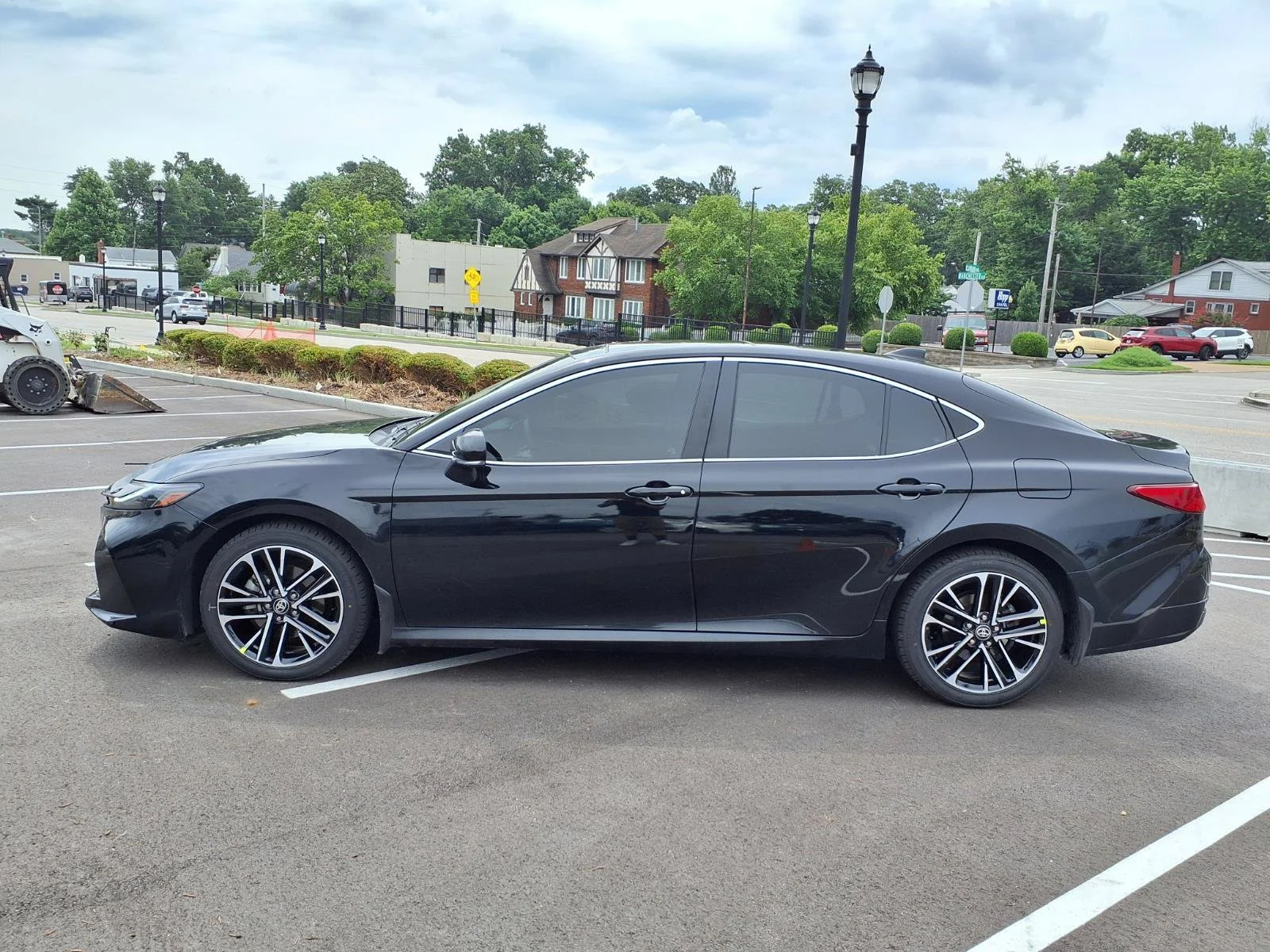 Certified Used 2025 Midnight Black Metallic Toyota XLE image 28