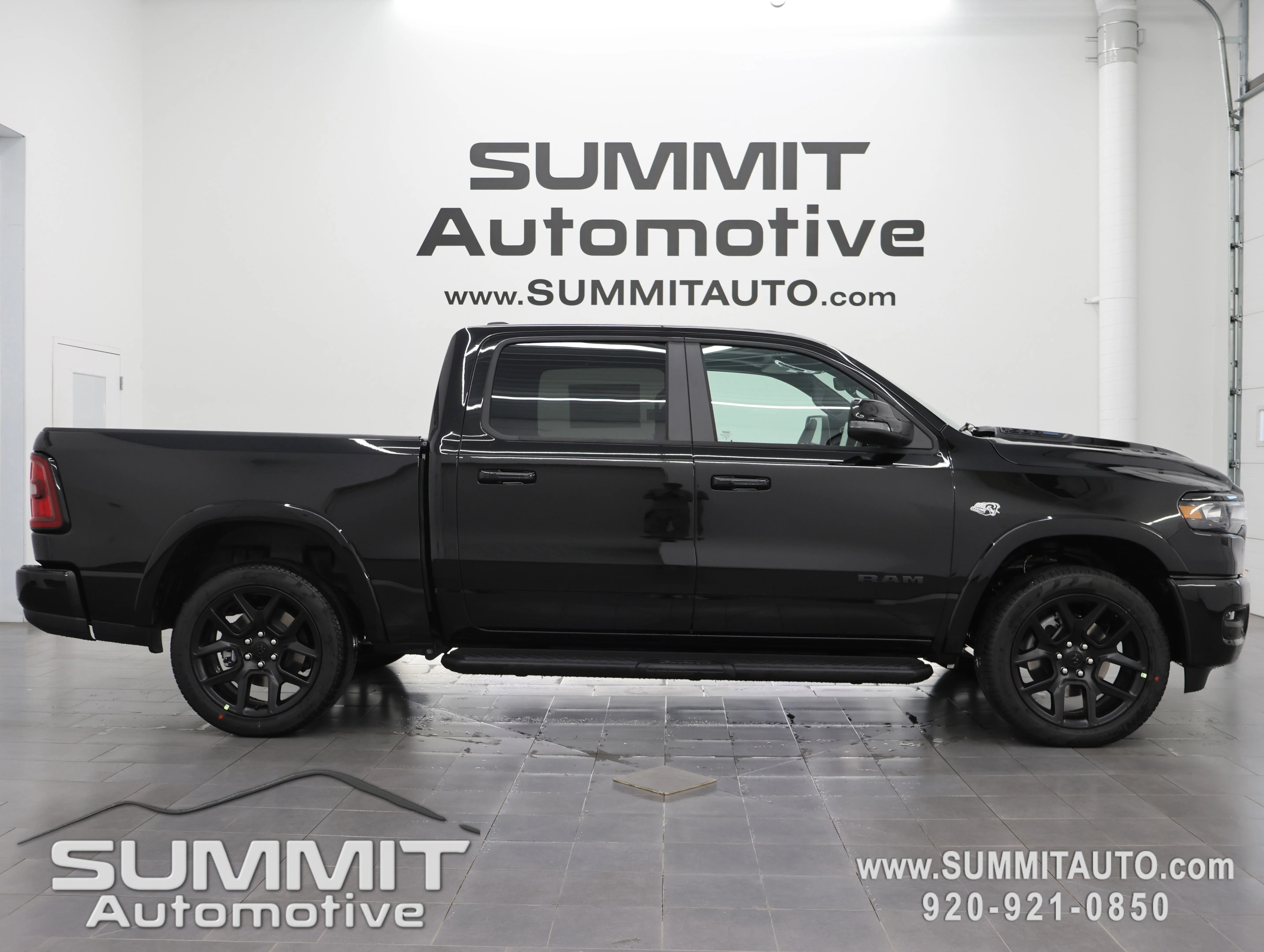 New 2026 Diamond Black Crystal Pearl-Coat Exterior Paint RAM Laramie image 1