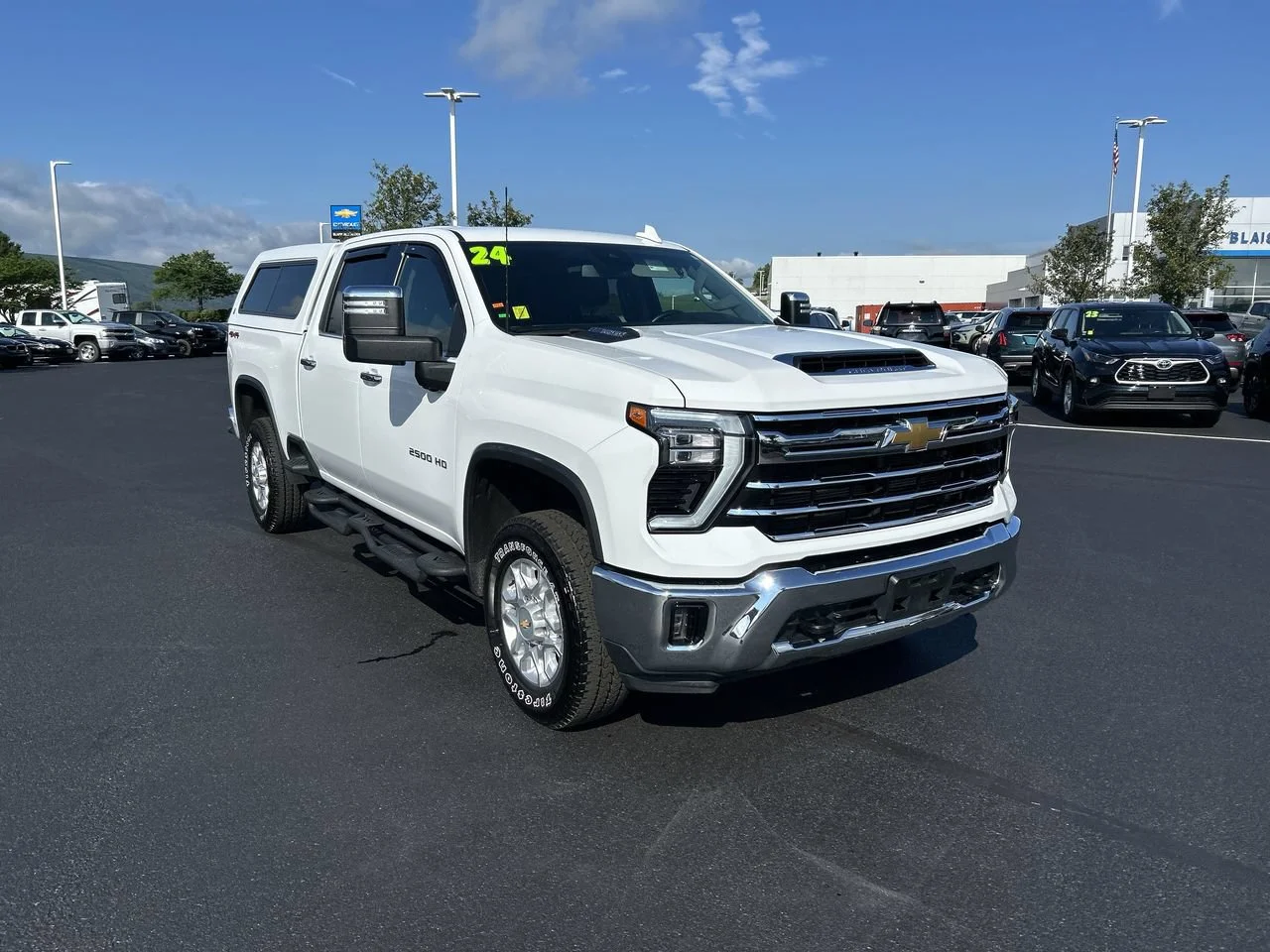 Used 2024 Summit White Chevrolet LTZ image 1