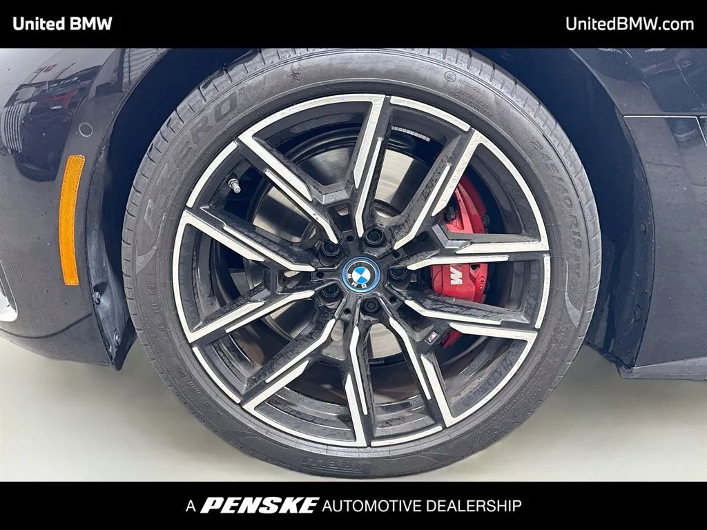 Certified Used 2023 Black Sapphire Metallic BMW eDrive40 image 2
