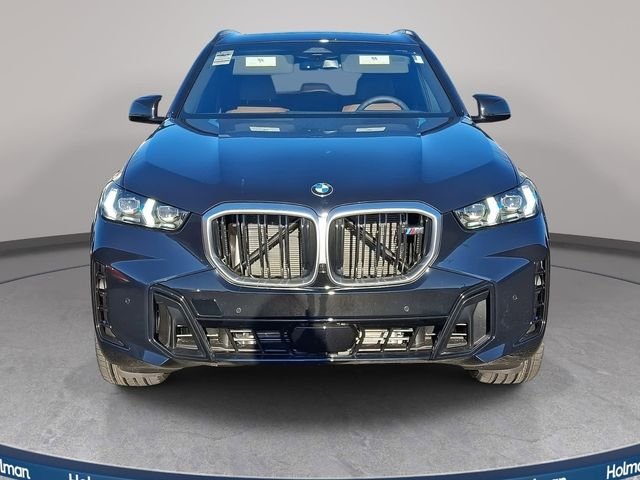 New 2026 Carbon Black Metallic BMW M60i image 2