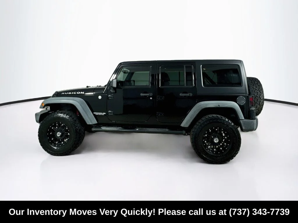 Used 2014 Black Clearcoat Jeep Unlimited Rubicon image 4