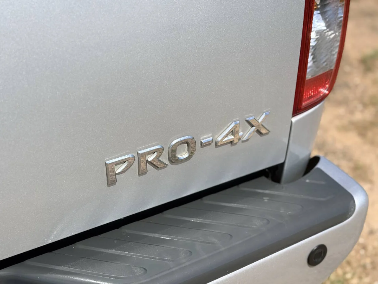 Used 2016 Silver Nissan PRO 4X 4x4 4dr Crew Cab 5 ft. SB Pickup 5A image 10
