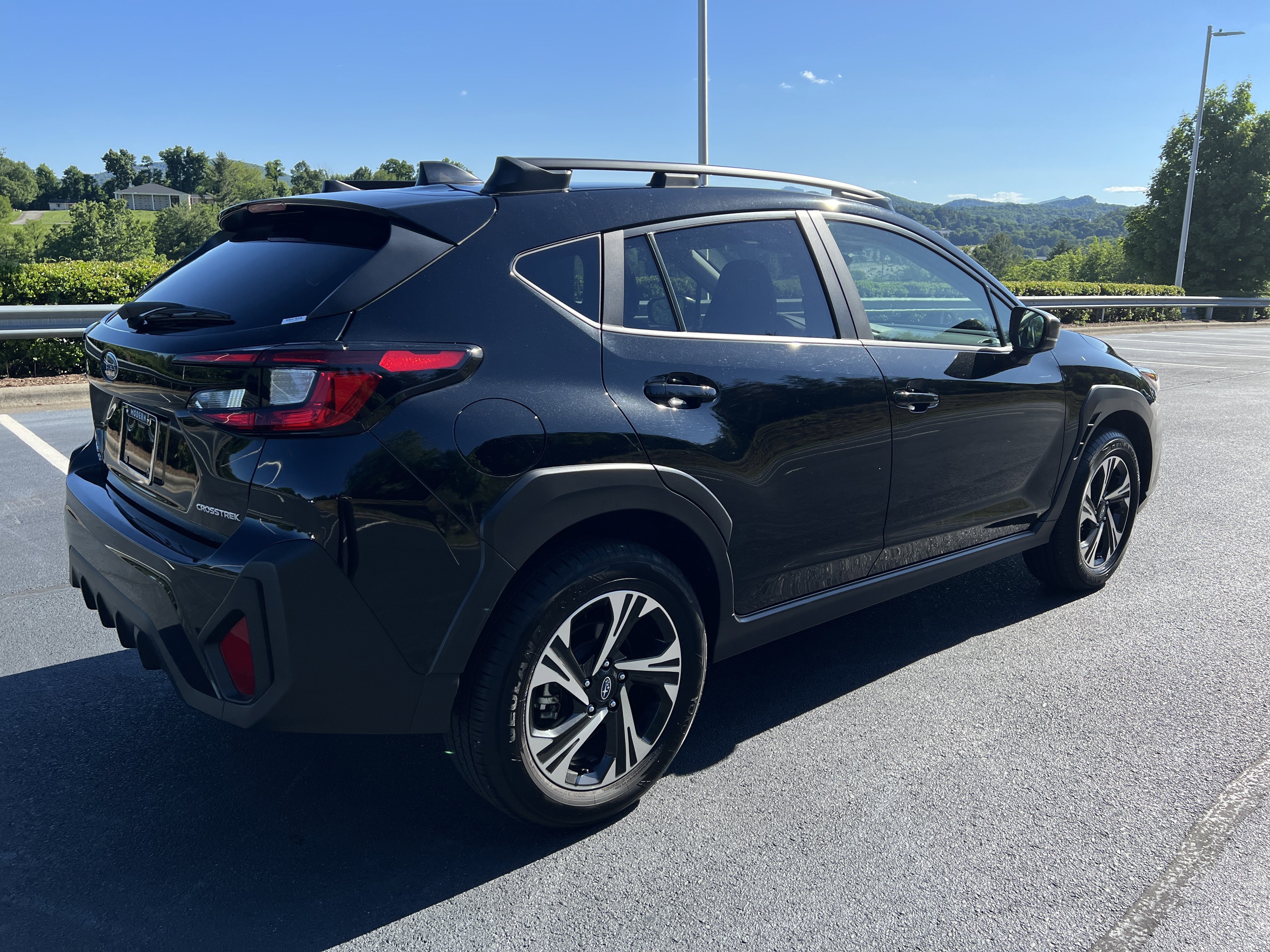 Used 2024 Crystal Black Silica Subaru Premium image 5
