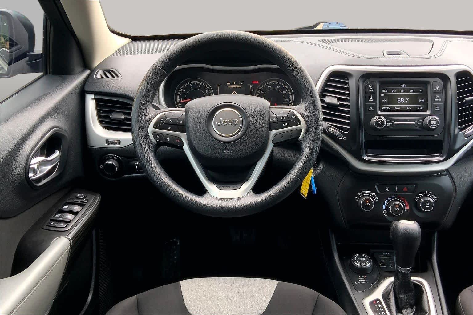 Used 2014 Brilliant Black Crystal Pearlcoat Jeep Sport image 5