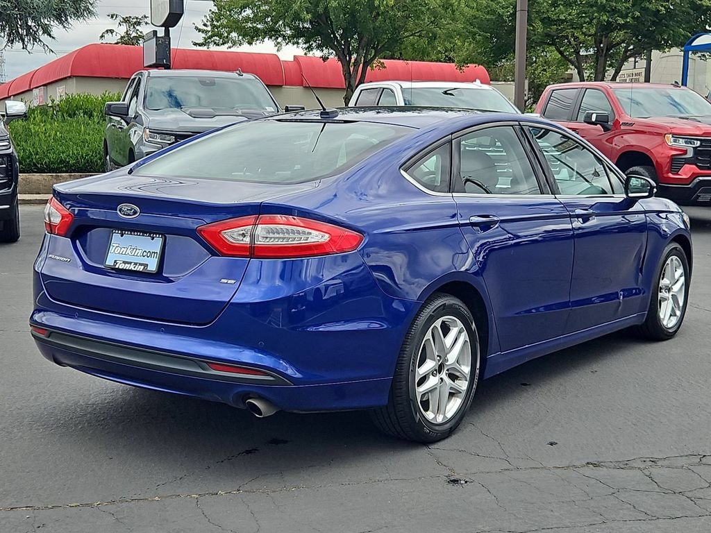 Used 2014 Blue Metallic Ford SE image 6