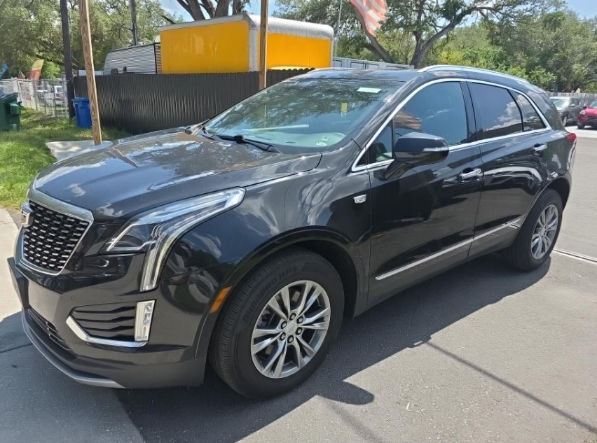 Used 2023 Black Cadillac Premium Luxury image 1