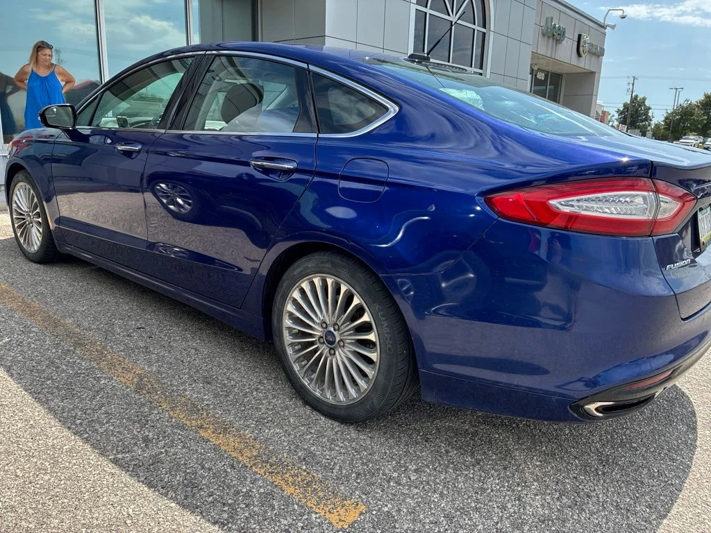 Used 2014 Blue Ford Titanium image 4