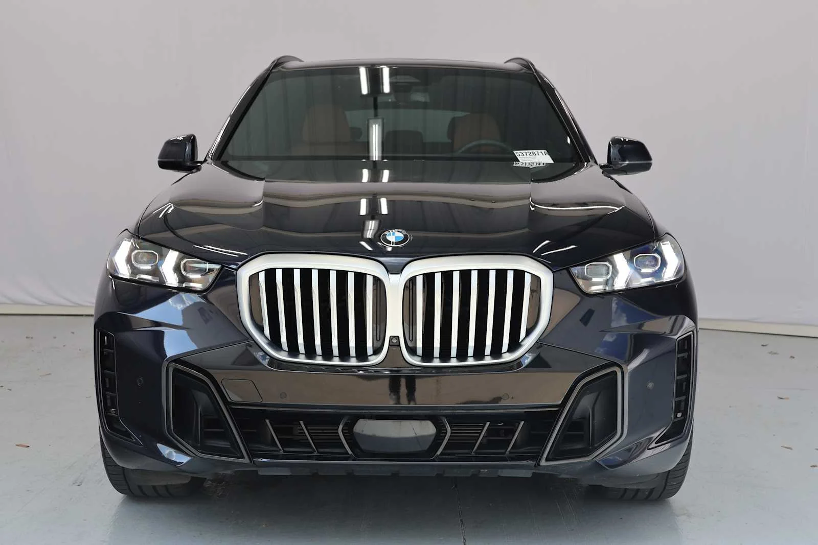 Certified Used 2025 Carbon Black Metallic BMW xDrive40i image 2