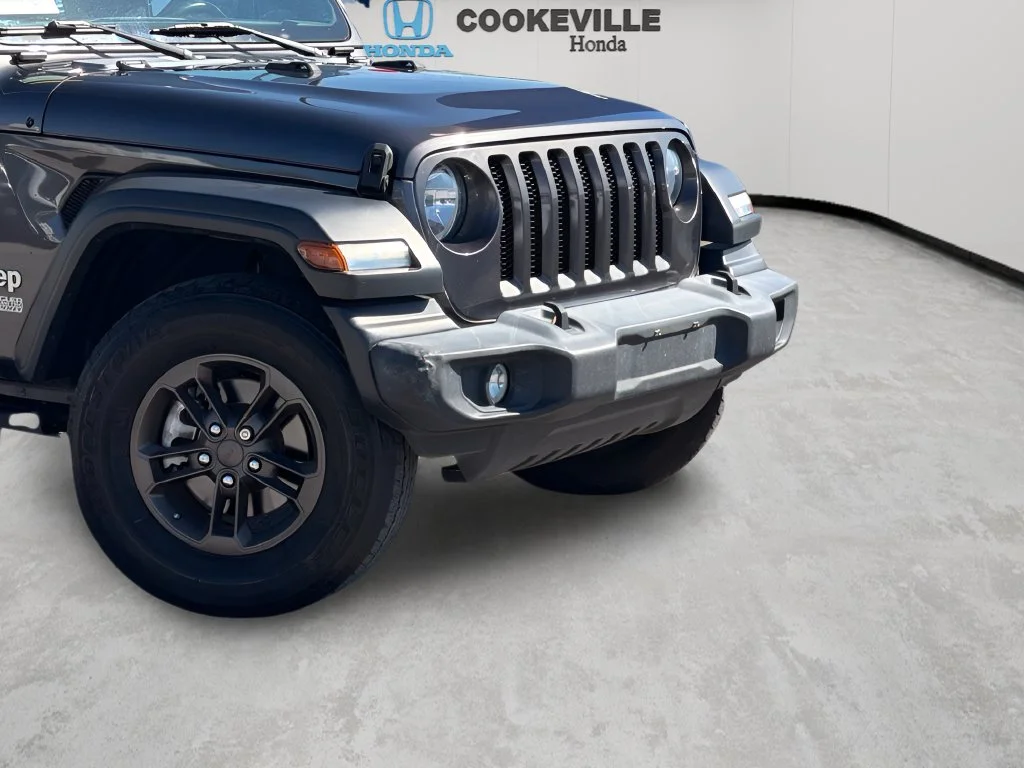 Used 2021 Granite Crystal Metallic Clearcoat Jeep Unlimited Sport image 3