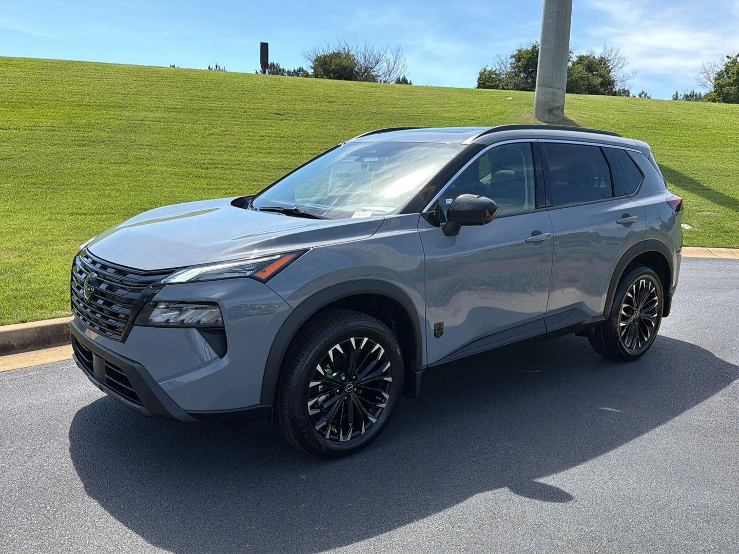 New 2026 Boulder Gray Pearl Nissan Dark Armor image 1