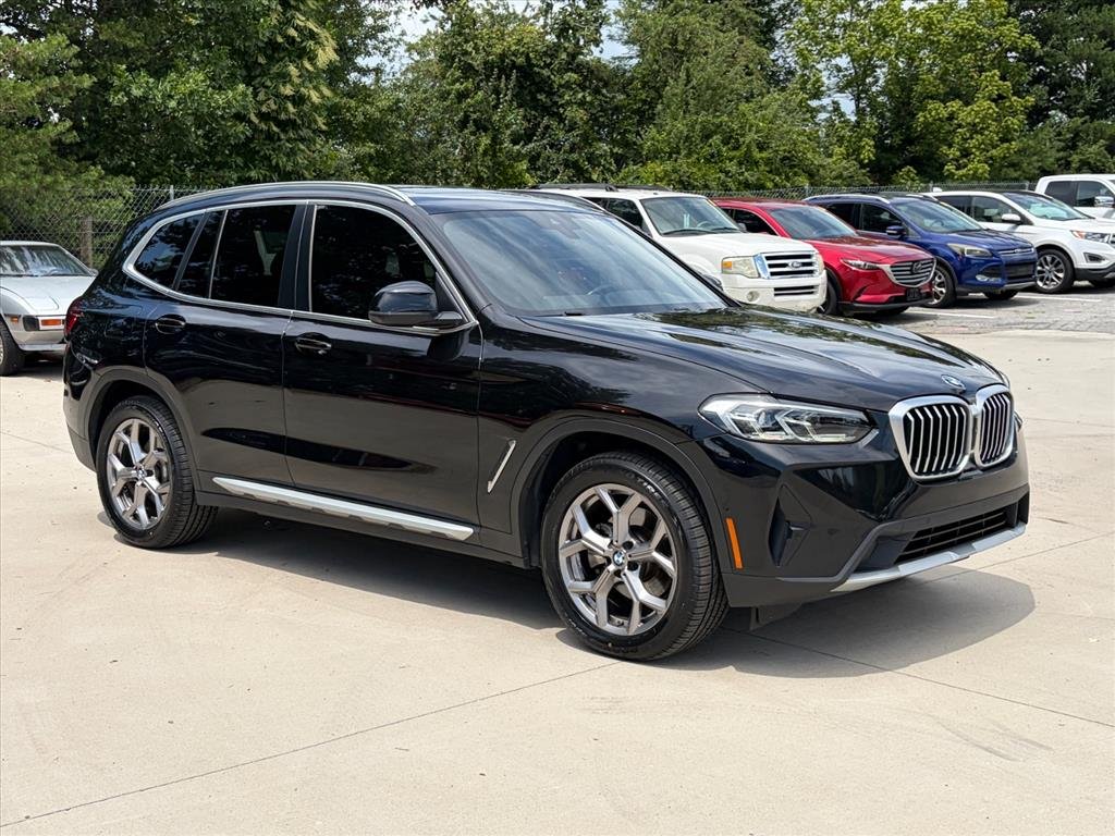 Used 2023 Black Sapphire Metallic BMW xDrive30i image 1