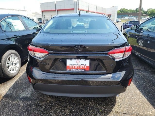 Used 2025 Midnight Black Metallic Toyota LE image 5