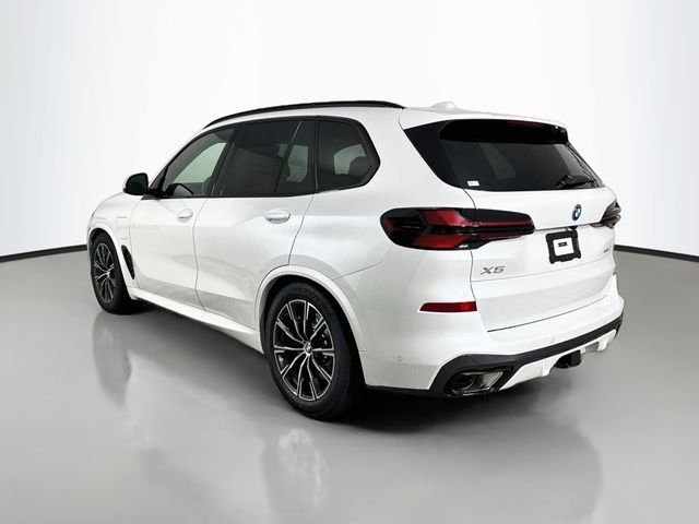 Used 2026 White Metallic BMW xDrive50e image 5