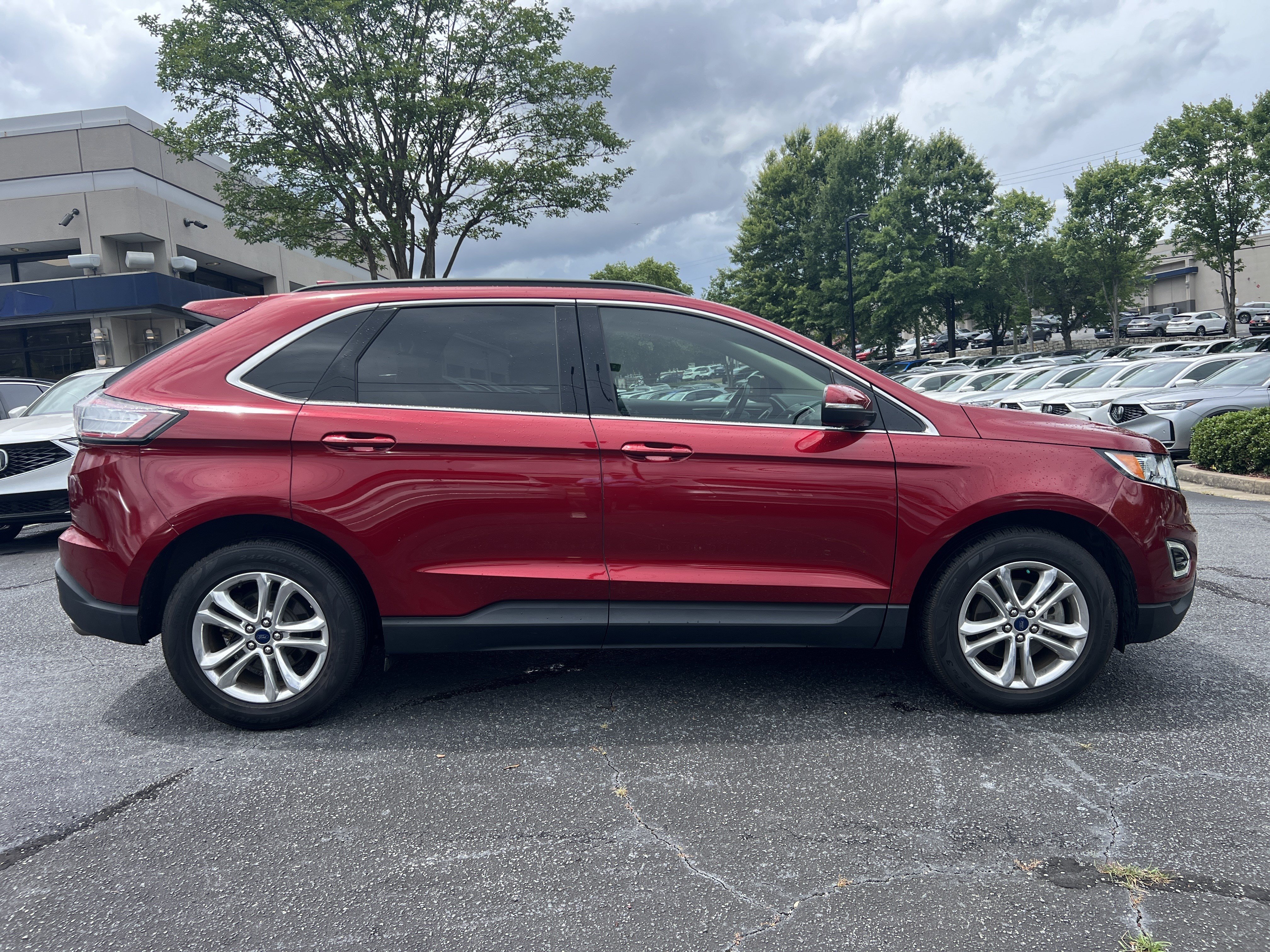 Used 2017 Ruby Red Metallic Tinted Clearcoat Ford SEL image 6
