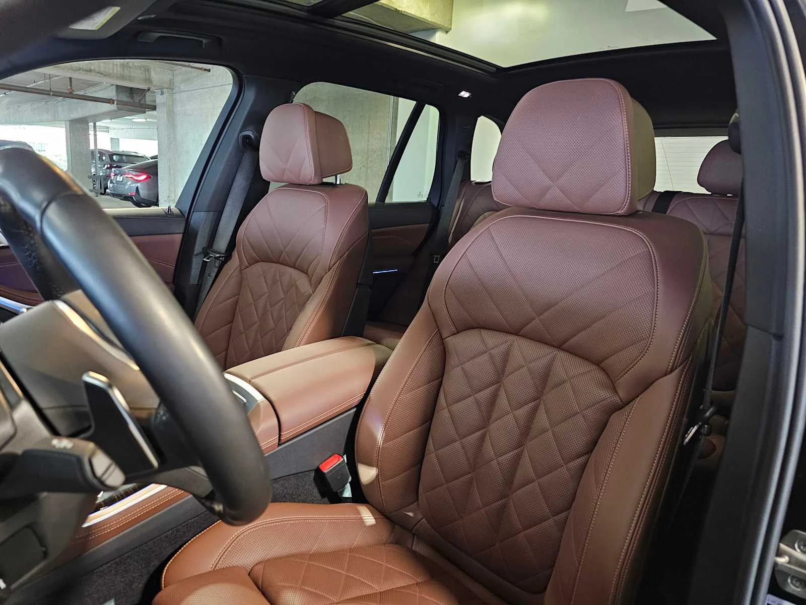 Used 2024 Carbon Black Metallic BMW xDrive50e image 26