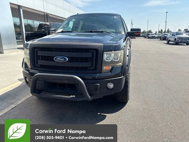 Used 2014 Black Ford FX4 image 2