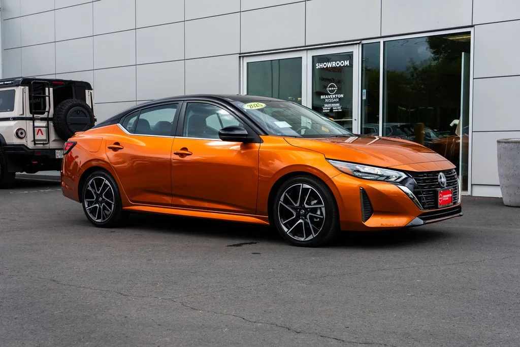 Certified Used 2025 Orange Nissan SR image 1