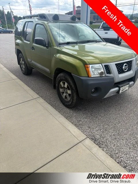 Used 2011 Green Nissan PRO-4X image 1