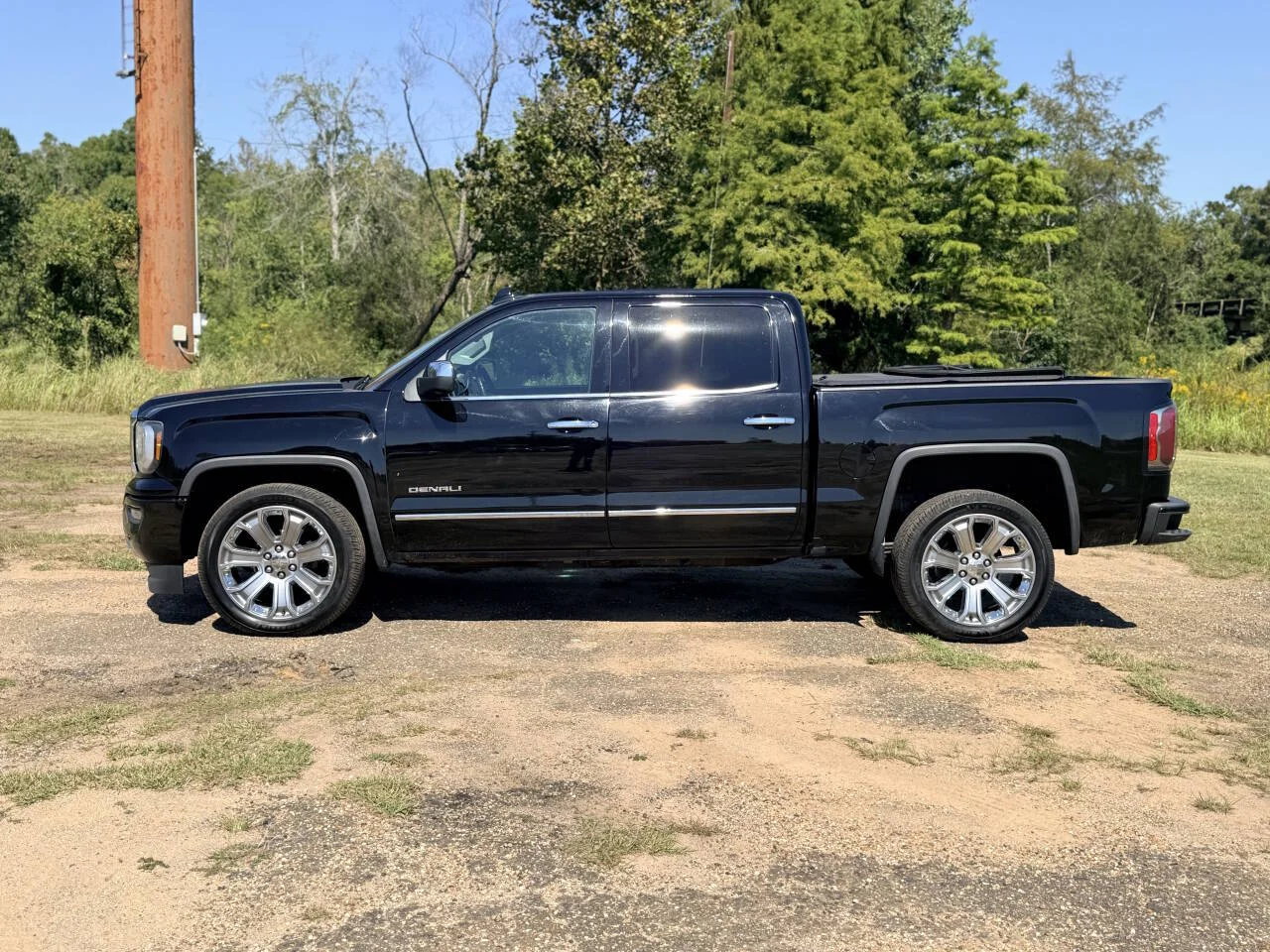 Used 2017 Black GMC Denali 4x4 4dr Crew Cab 5.8 ft. SB image 2