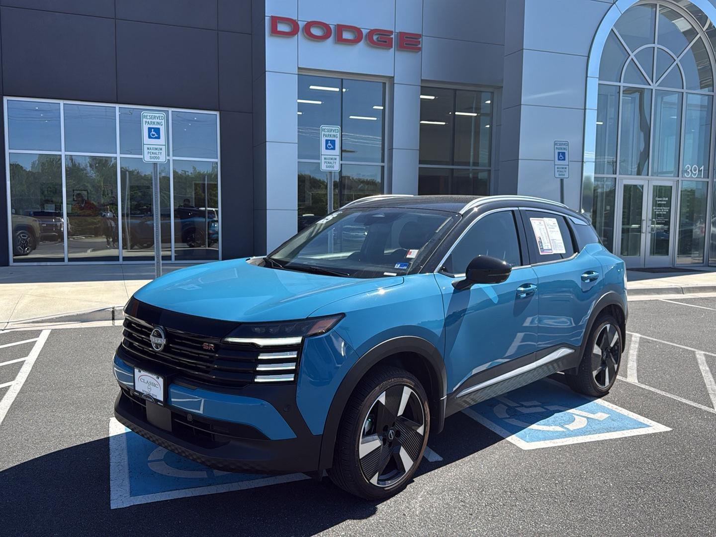 Used 2025 Arctic Ice Blue Metallic/Super Black Nissan SR image 1