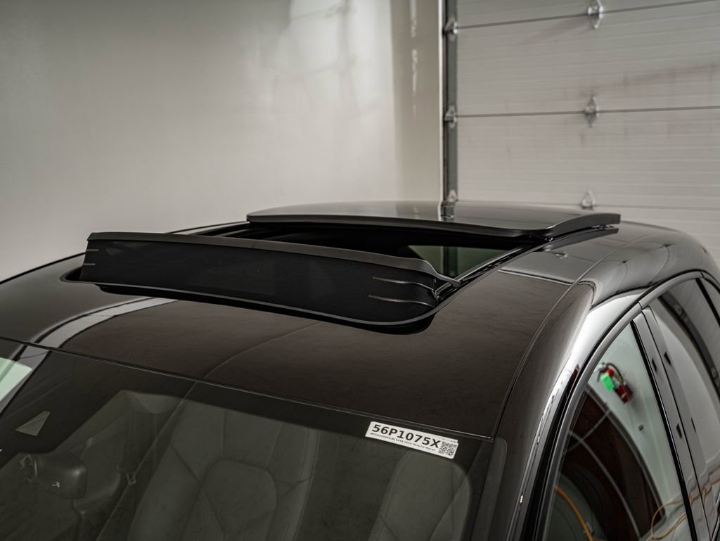 Certified Used 2025 Jet Black Metallic Porsche  image 21