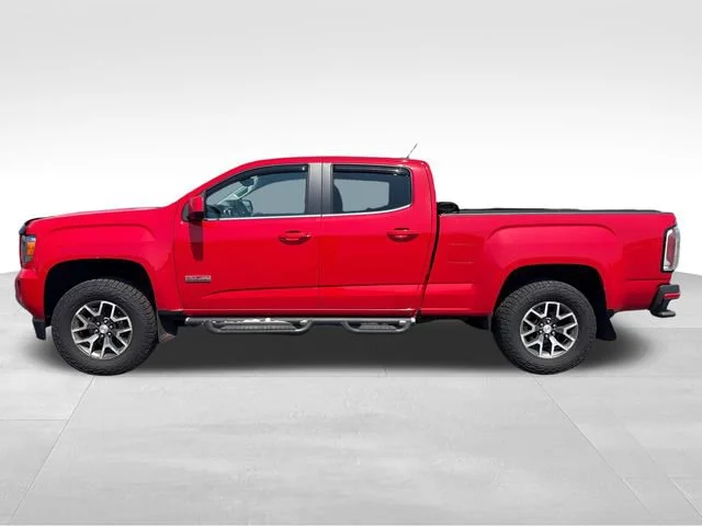 Used 2015 Cardinal Red GMC 4WD SLE image 2