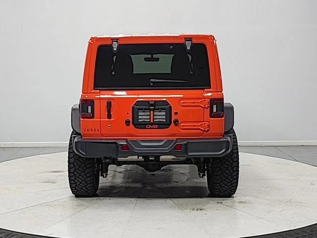 Used 2018 Orange Jeep Unlimited Sahara image 6
