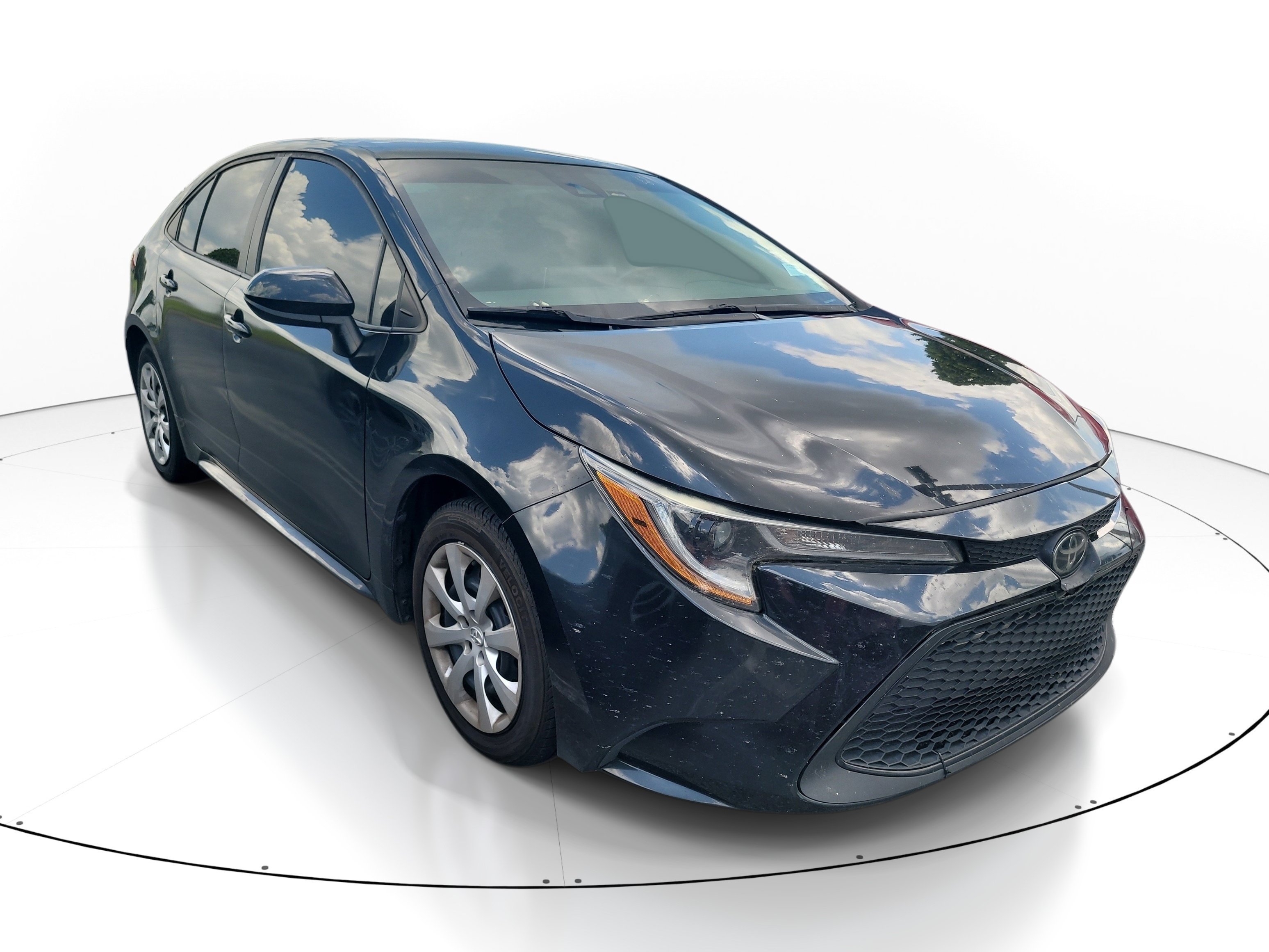 Used 2021 Black Sand Pearl Toyota LE image 1