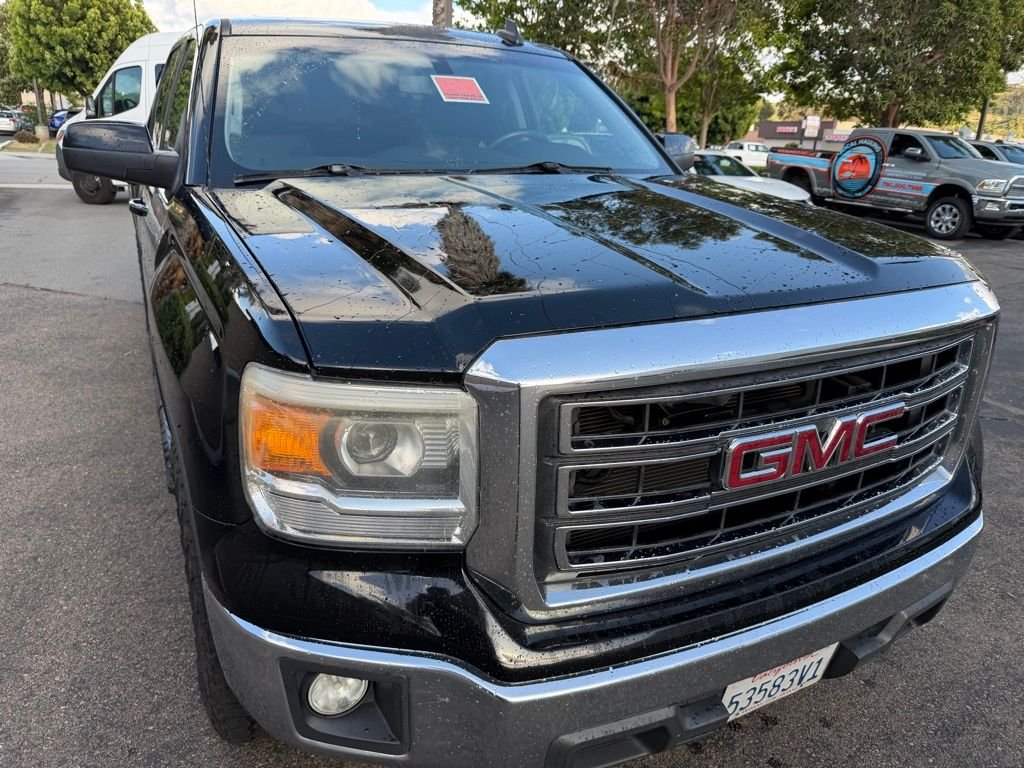 Used 2015 Black GMC SLE image 1