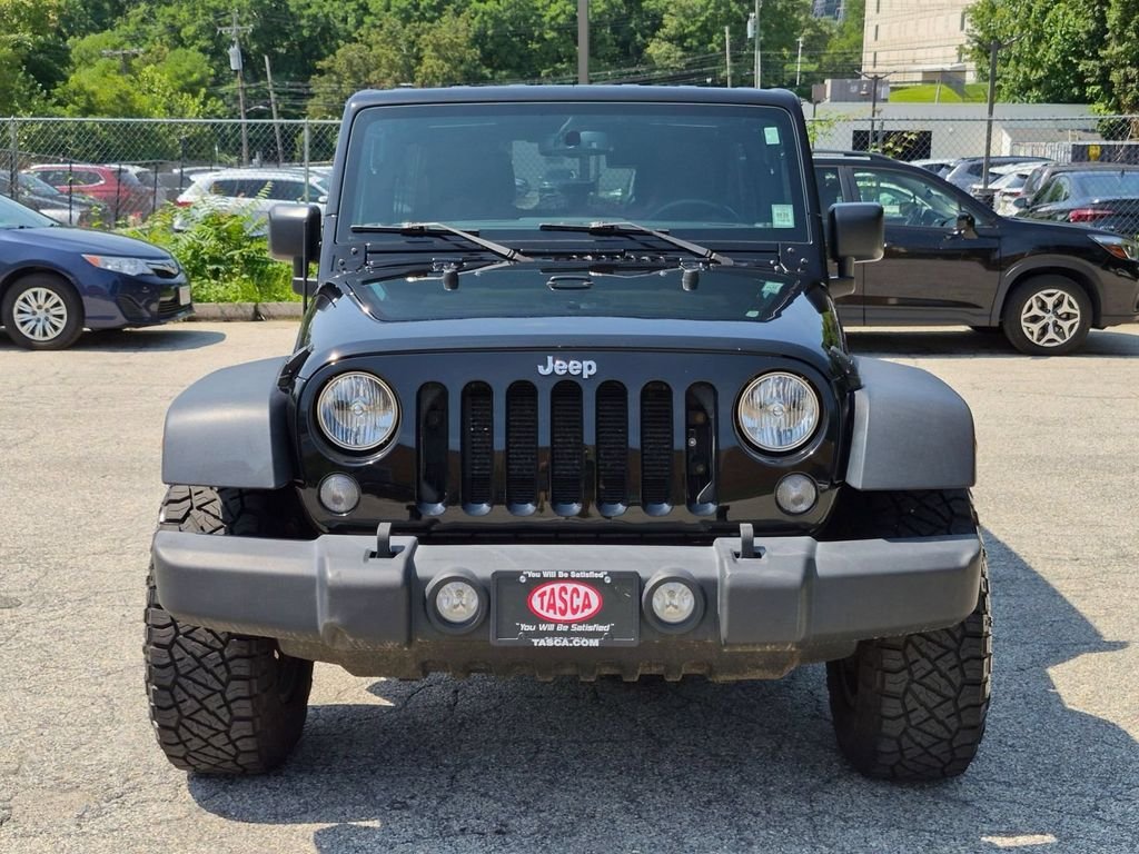 Used 2016 Black Jeep Unlimited Sport image 10