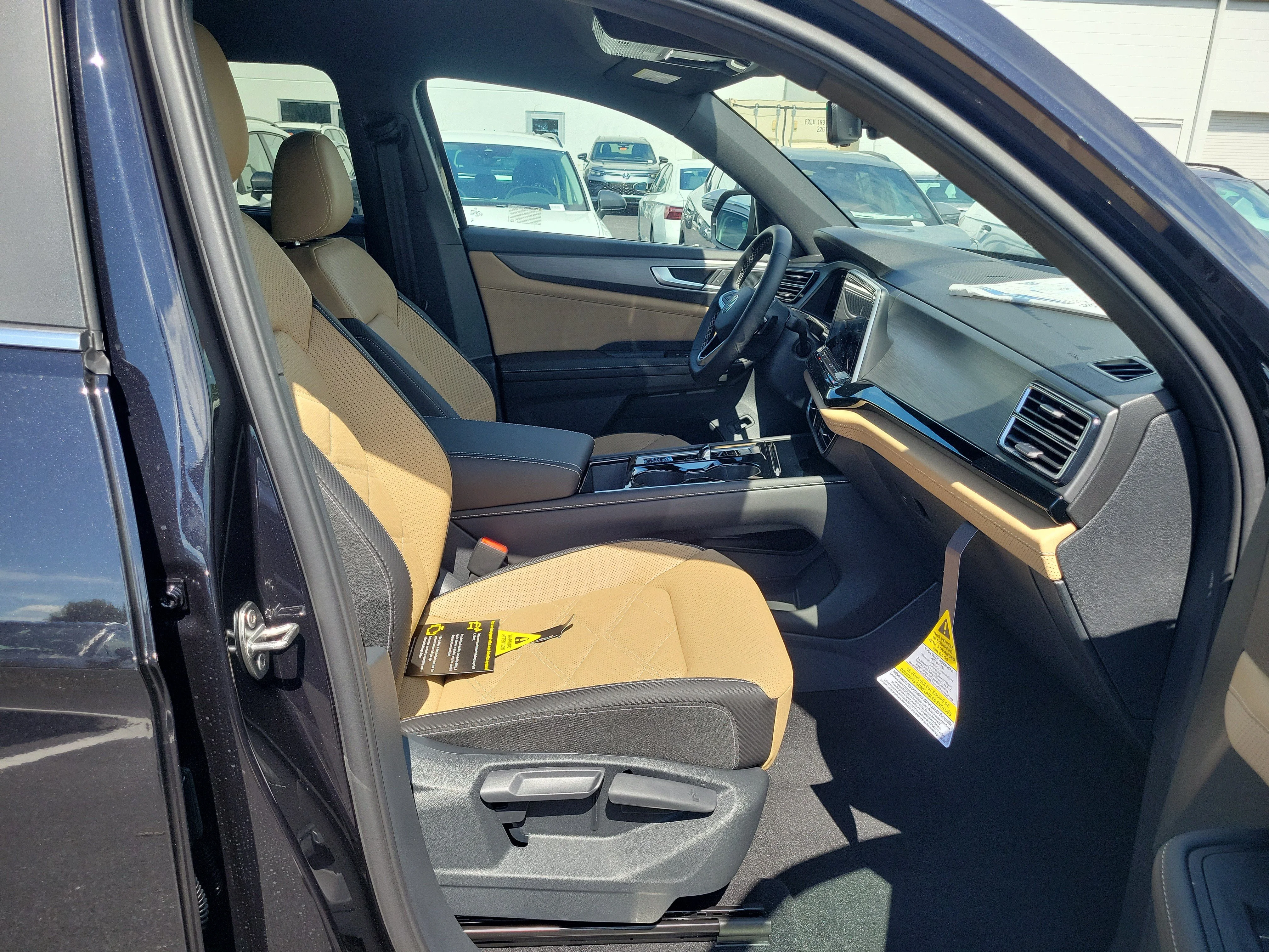 New 2026 Black Volkswagen SE w/Technology image 11