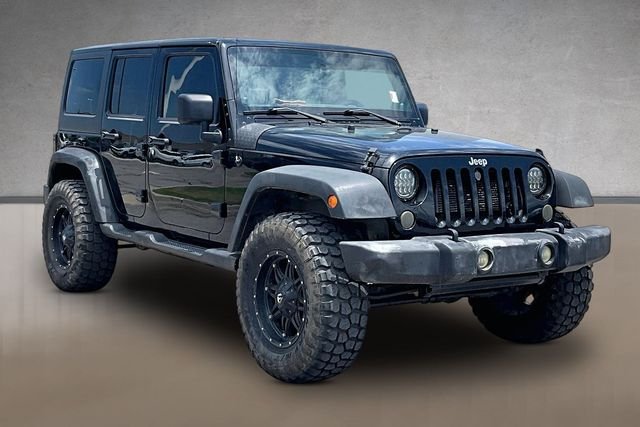 Used 2013 Black Clearcoat Jeep Unlimited Sport image 7