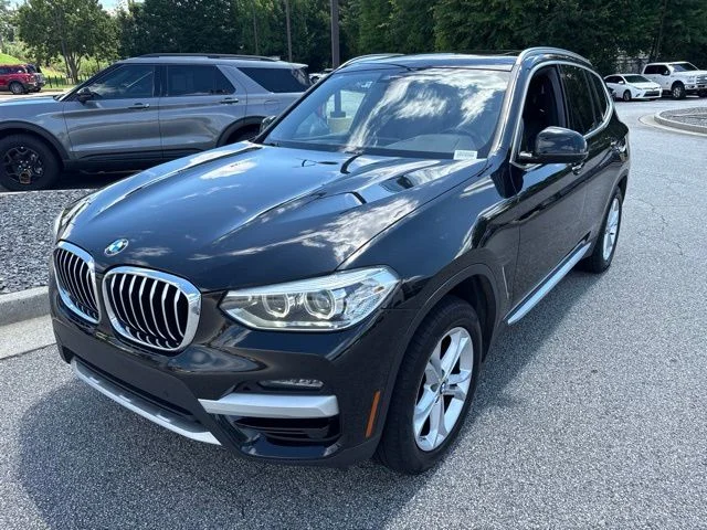 Used 2021 Black BMW sDrive30i image 4