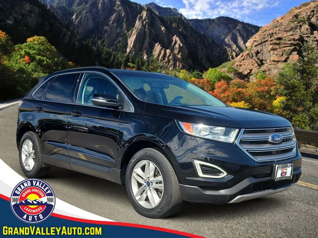 Used 2016 Black Ford SEL image 1