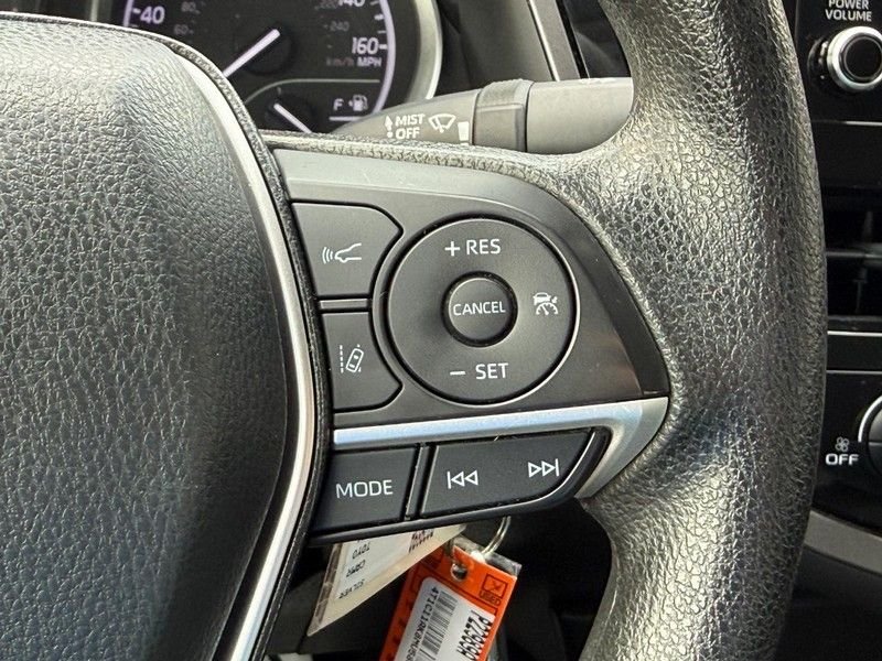 Used 2021 Celestial Silver Metallic Toyota LE image 21