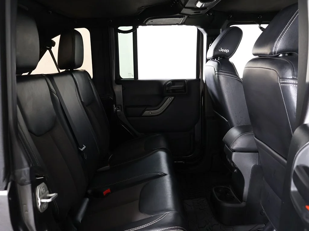 Used 2018 Granite Crystal Metallic Clearcoat Jeep Unlimited Sport image 25