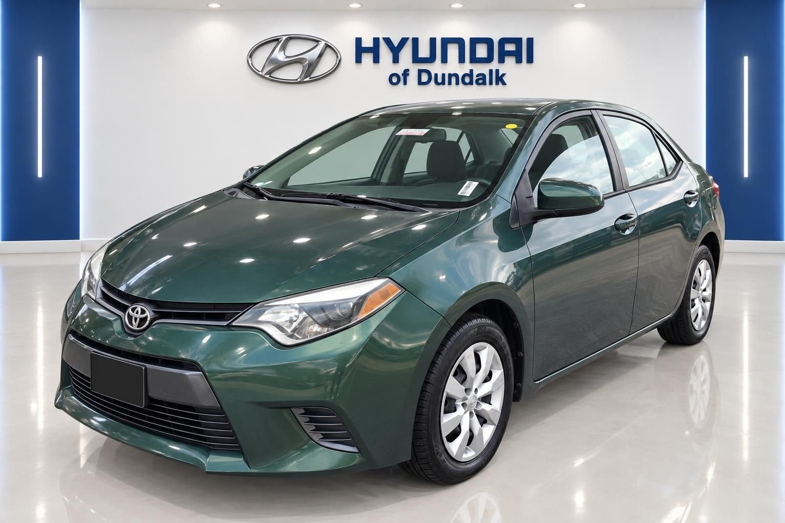 Used 2016 Green Toyota LE image 1