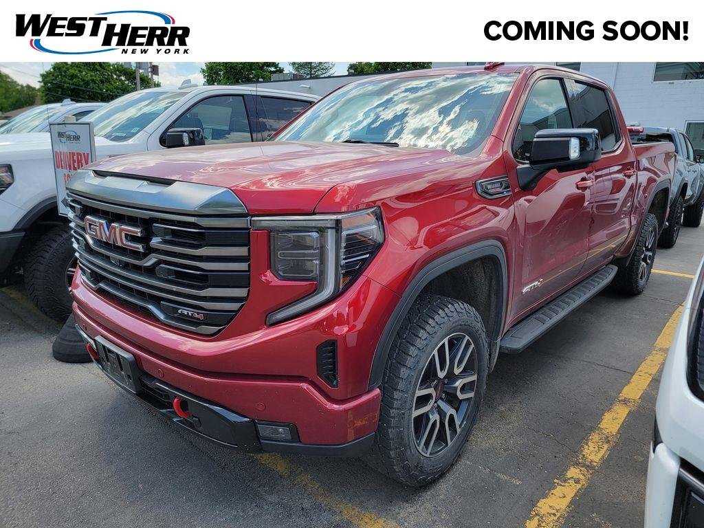 Used 2024 Volcanic Red Tintcoat GMC AT4 image 1