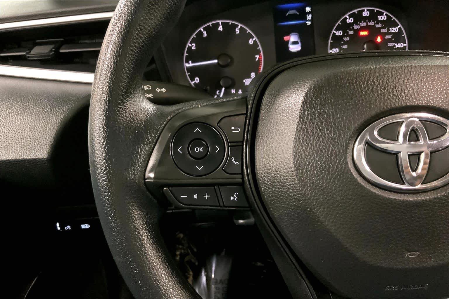 Used 2024 Midnight Black Metallic Toyota LE image 24