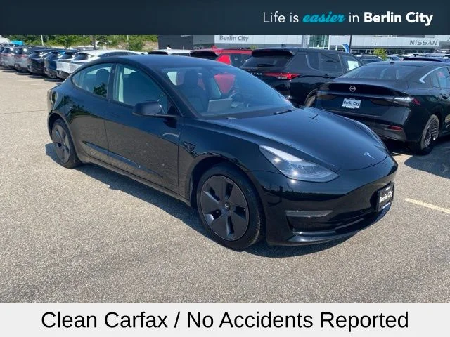 Used 2022 Solid Black Tesla Long Range image 1