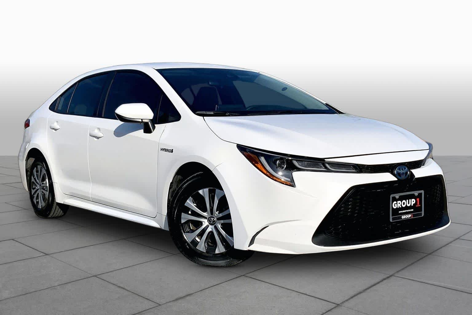 Used 2020 Super White Toyota Hybrid LE image 3