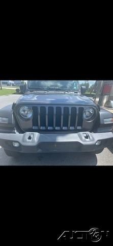 Used 2021 Gray Jeep Sport image 1