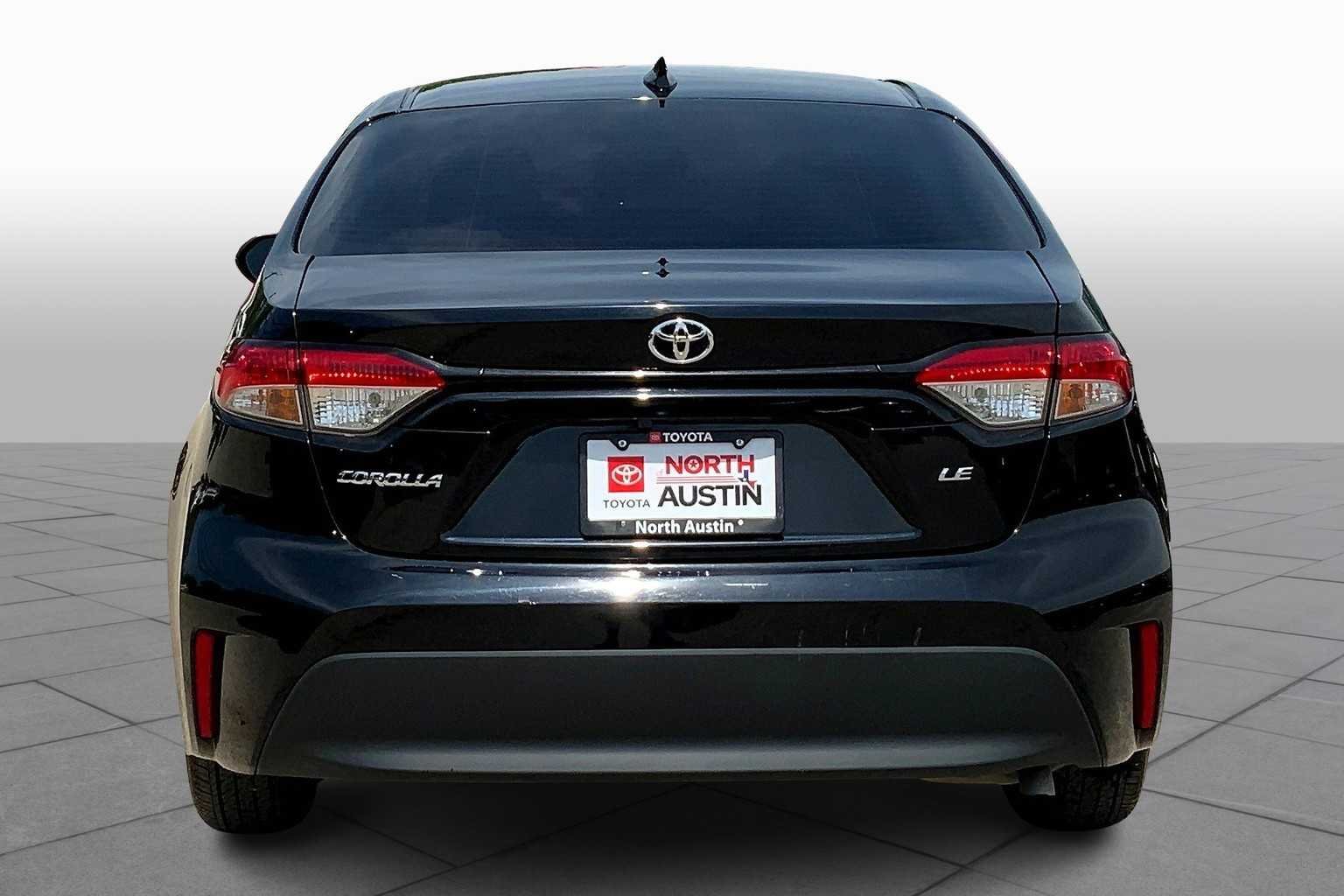Used 2023 Midnight Black Metallic Toyota LE image 5
