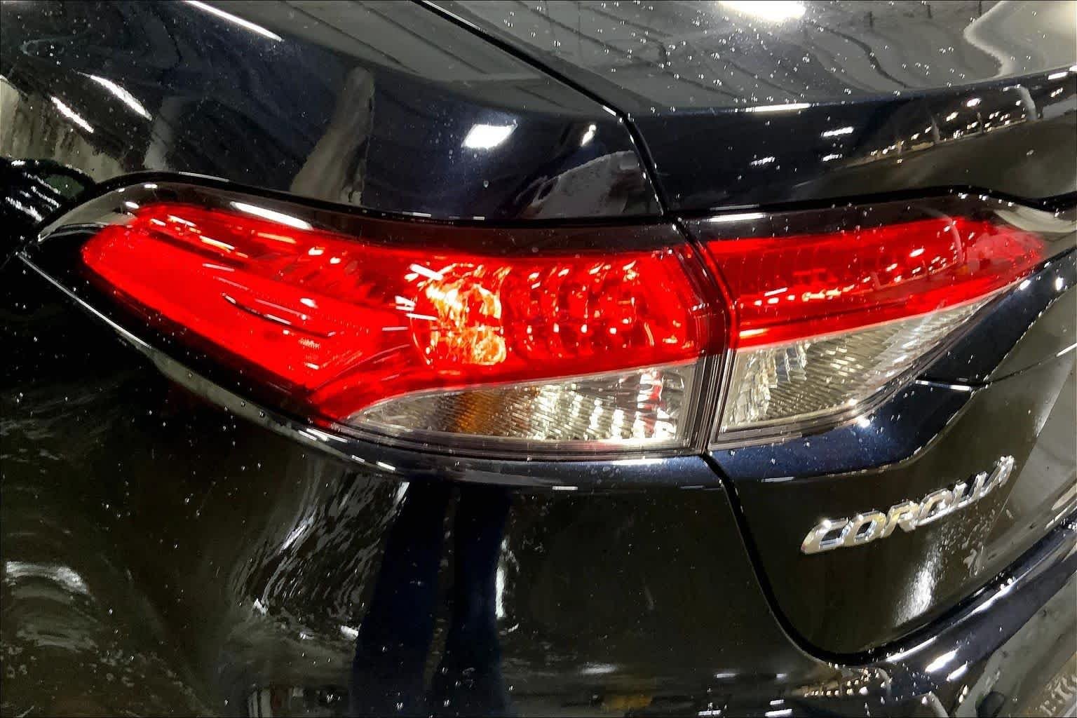Used 2024 Midnight Black Metallic Toyota LE image 29