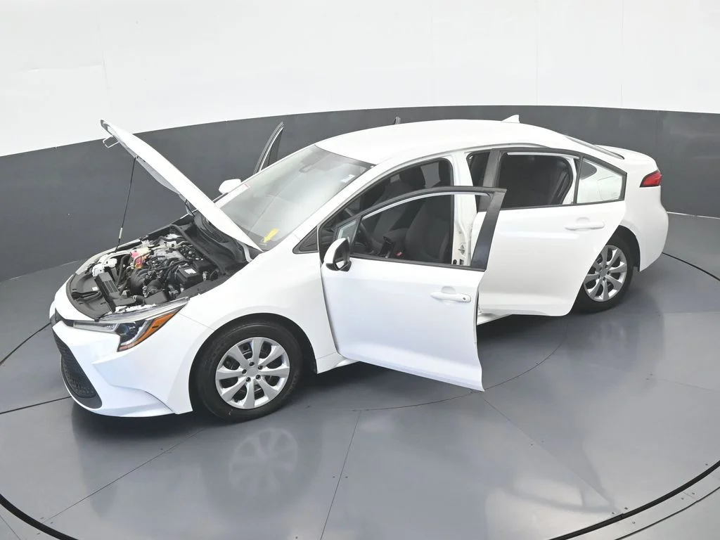 Used 2021 Super White Toyota LE image 53